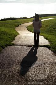 woman walking country path